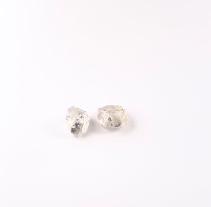 Handpicked Herkimer Diamond undrilled rough gemstones displaying raw sparkle, natural inclusions and crisp geometric edges.