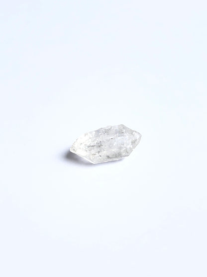 Close‑up of Herkimer Diamond rough stone highlighting its bright shine and authentic gemstone texture.