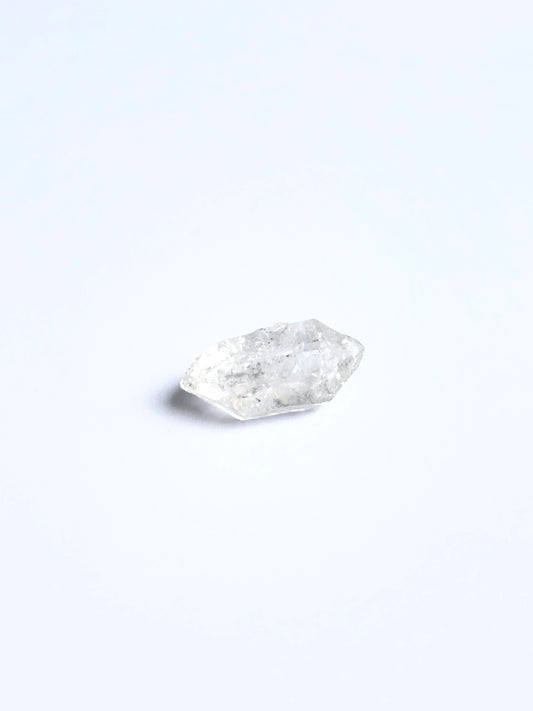 Close‑up of Herkimer Diamond rough stone highlighting its bright shine and authentic gemstone texture.