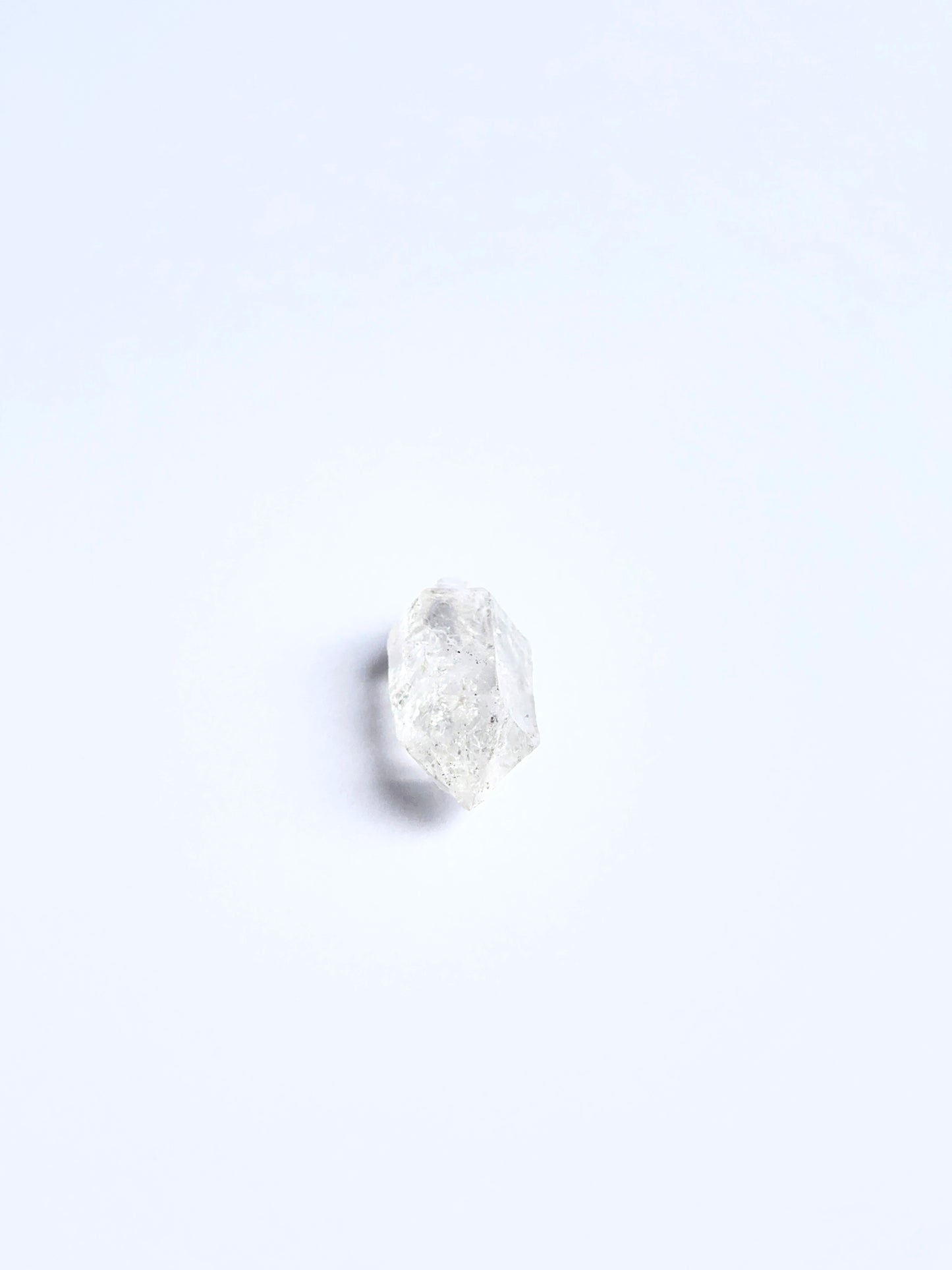 Herkimer Diamond rough piece arranged to showcase its clear facets and suitability for jewellery making.