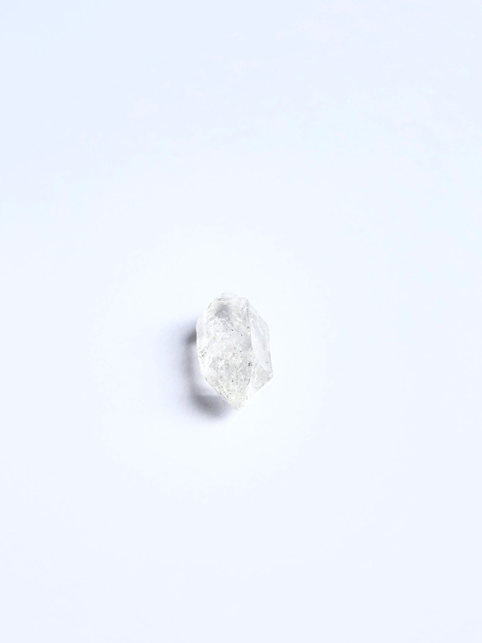 Herkimer Diamond rough piece arranged to showcase its clear facets and suitability for jewellery making.