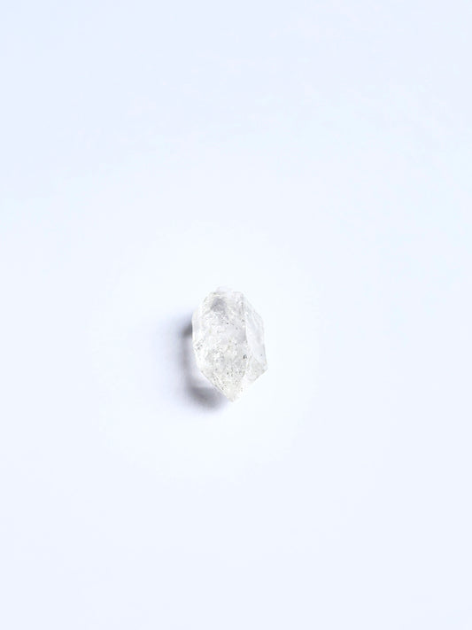 Herkimer Diamond rough piece arranged to showcase its clear facets and suitability for jewellery making.