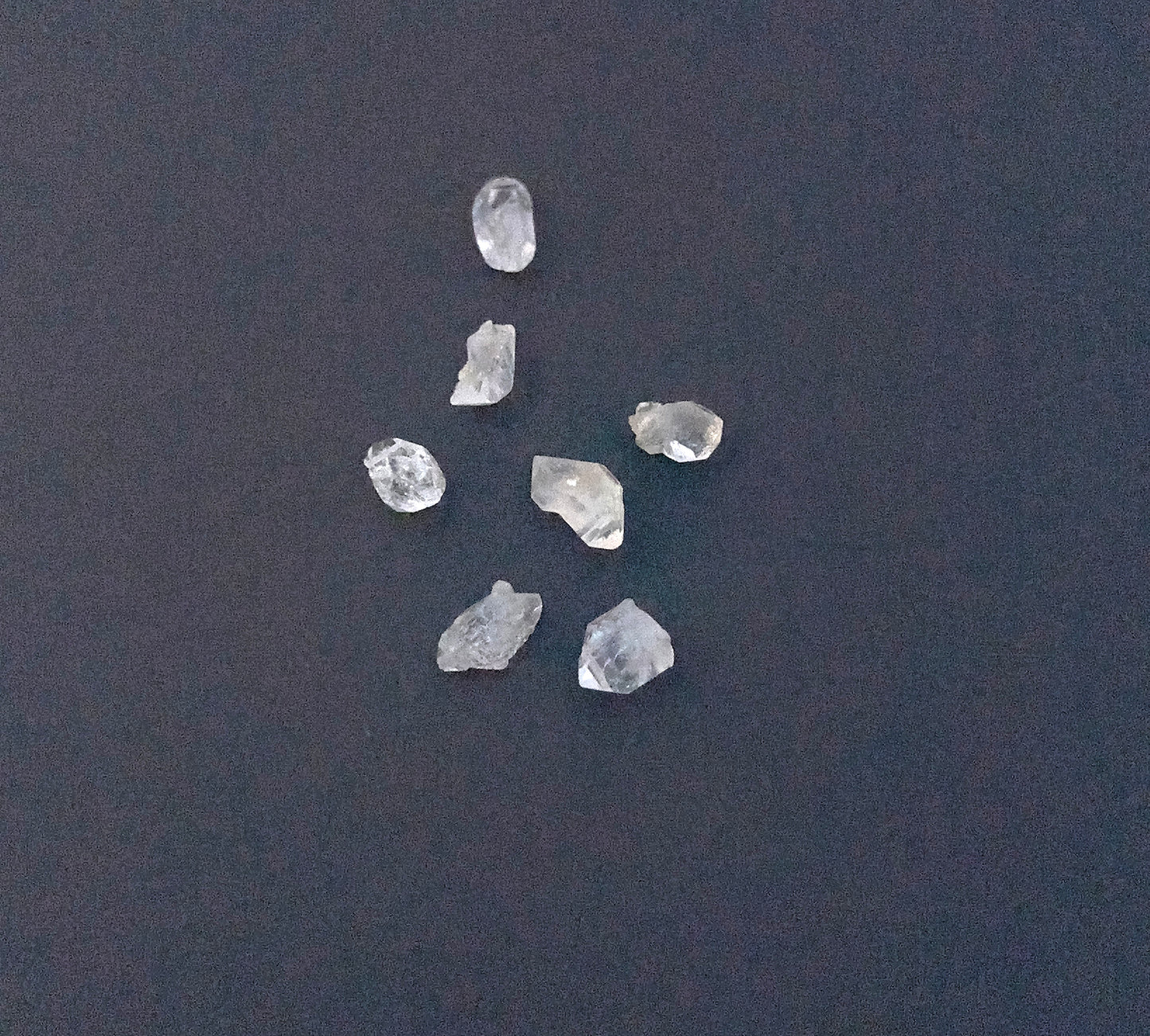 Stone beads with natural facets and untouched surfaces, perfect for wire wrapping and custom designs. 