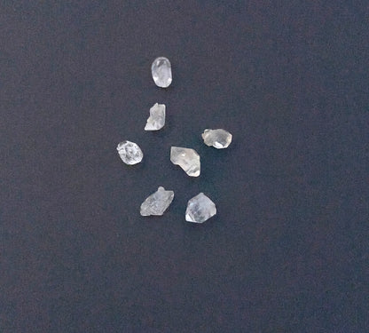 Stone beads with natural facets and untouched surfaces, perfect for wire wrapping and custom designs. 