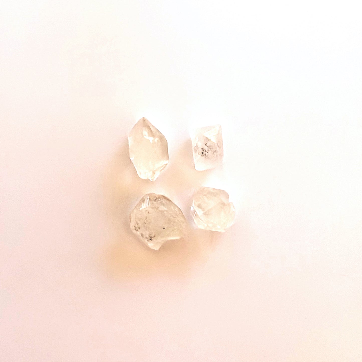 Natural Herkimer diamond crystals with uncut surfaces and organic brilliance.