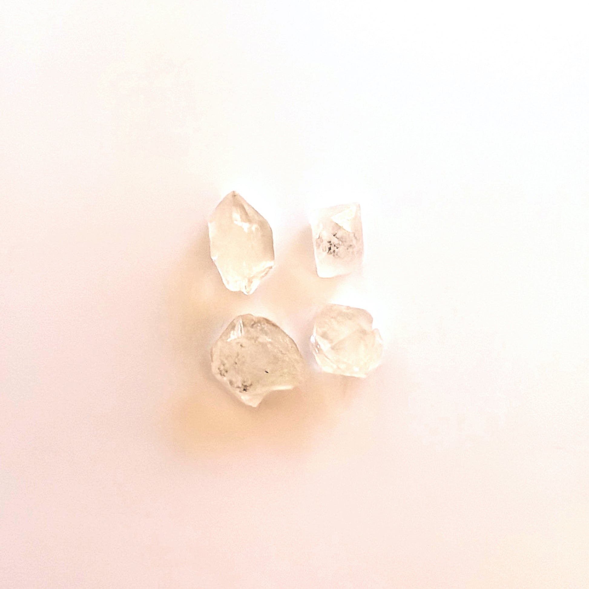 Natural Herkimer diamond crystals with uncut surfaces and organic brilliance.
