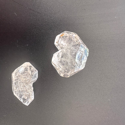 Close-up of Herkimer crystals showing natural facets and icy brilliance.