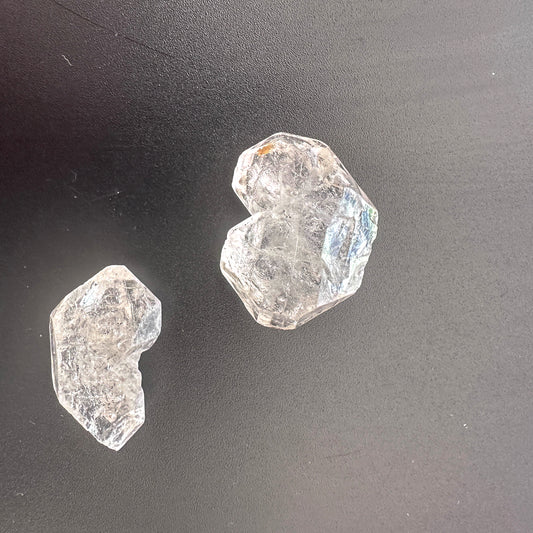 Close-up of Herkimer crystals showing natural facets and icy brilliance.