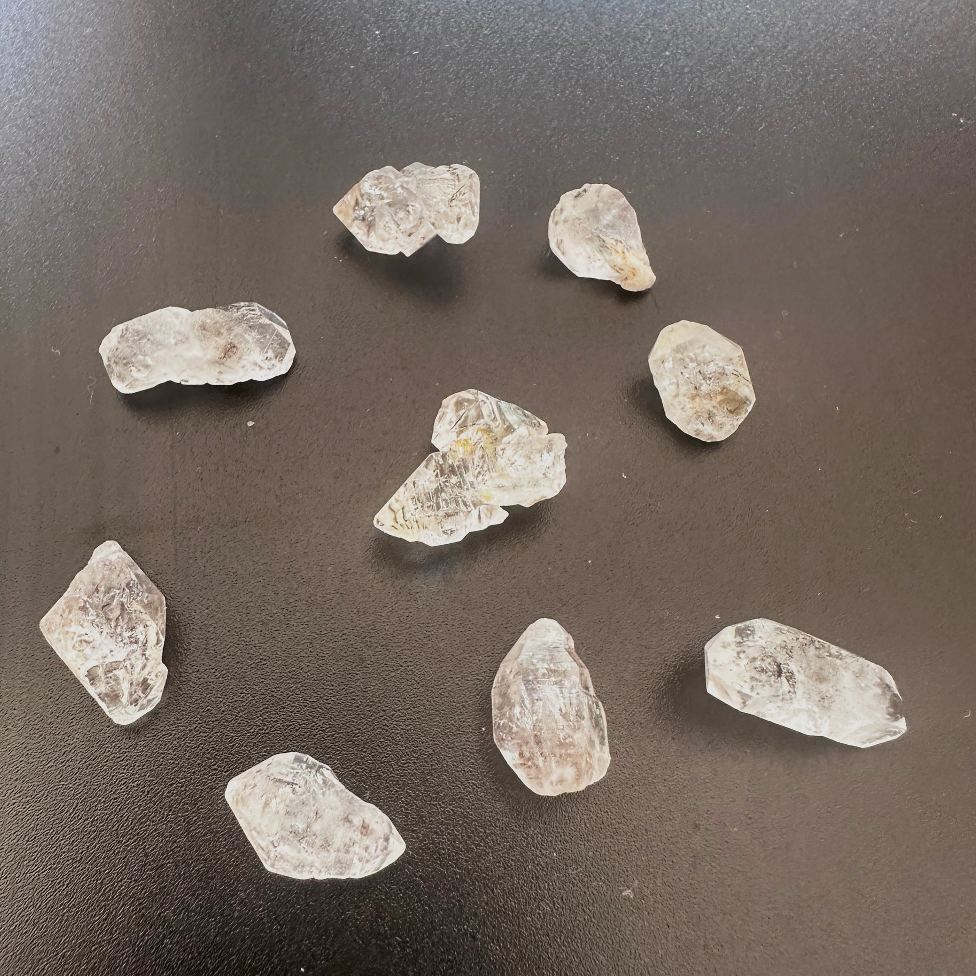 Herkimer undrilled nuggets with natural clarity and raw crystal texture in 9–11mm size.