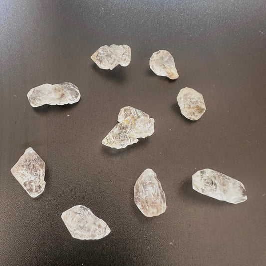 Herkimer undrilled nuggets with natural clarity and raw crystal texture in 9–11mm size.