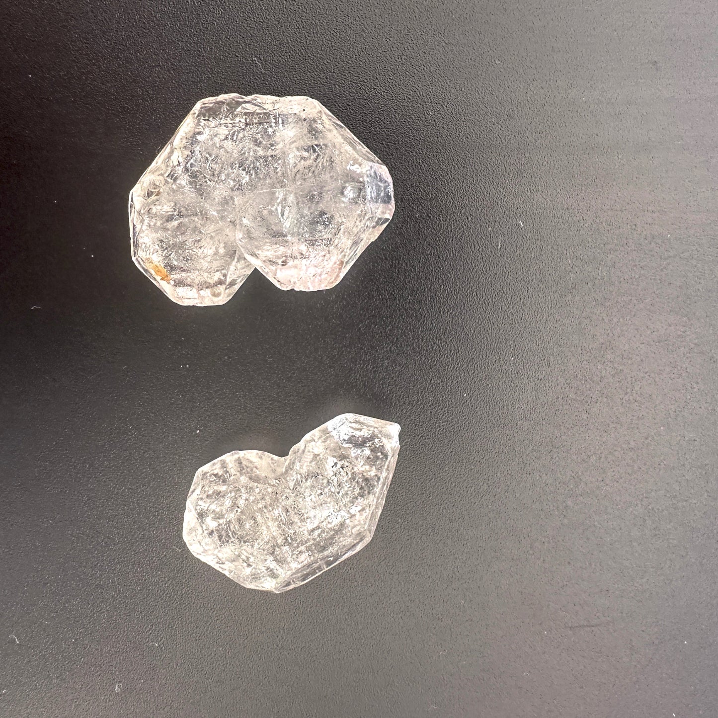 Herkimer undrilled nuggets with high clarity and raw double-terminated points in a 2-piece pack.