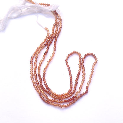  Sparkling stone beads arranged on a 31cm strand for handmade jewellery components. 