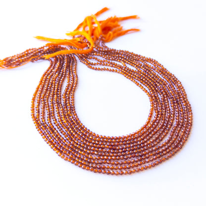 Hessonite faceted rondelle beads in 2.4mm size on a 32cm strand, showcasing genuine gemstone sparkle for handmade jewellery.