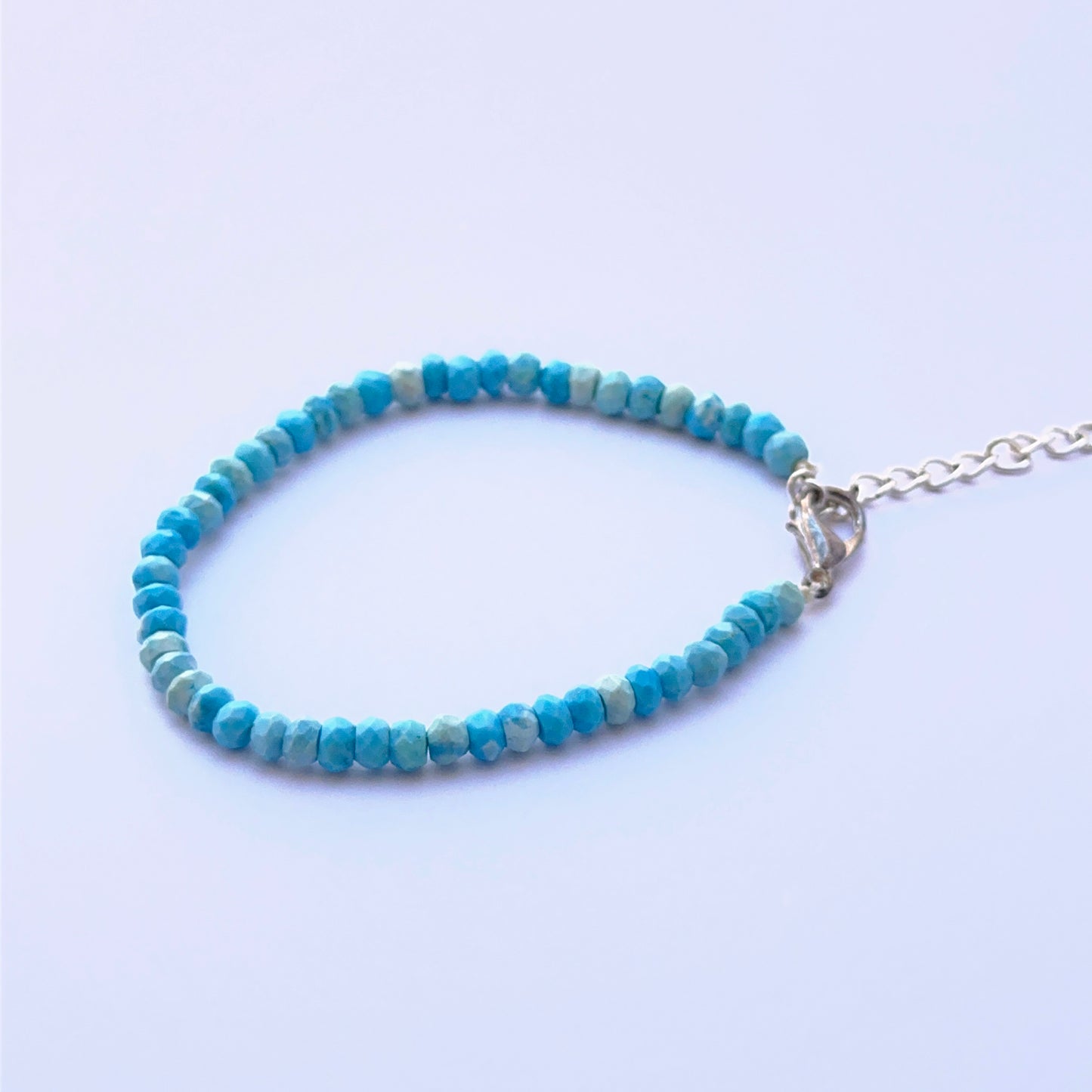Turquoise bracelet with sparkling rondelle beads showing natural colour.