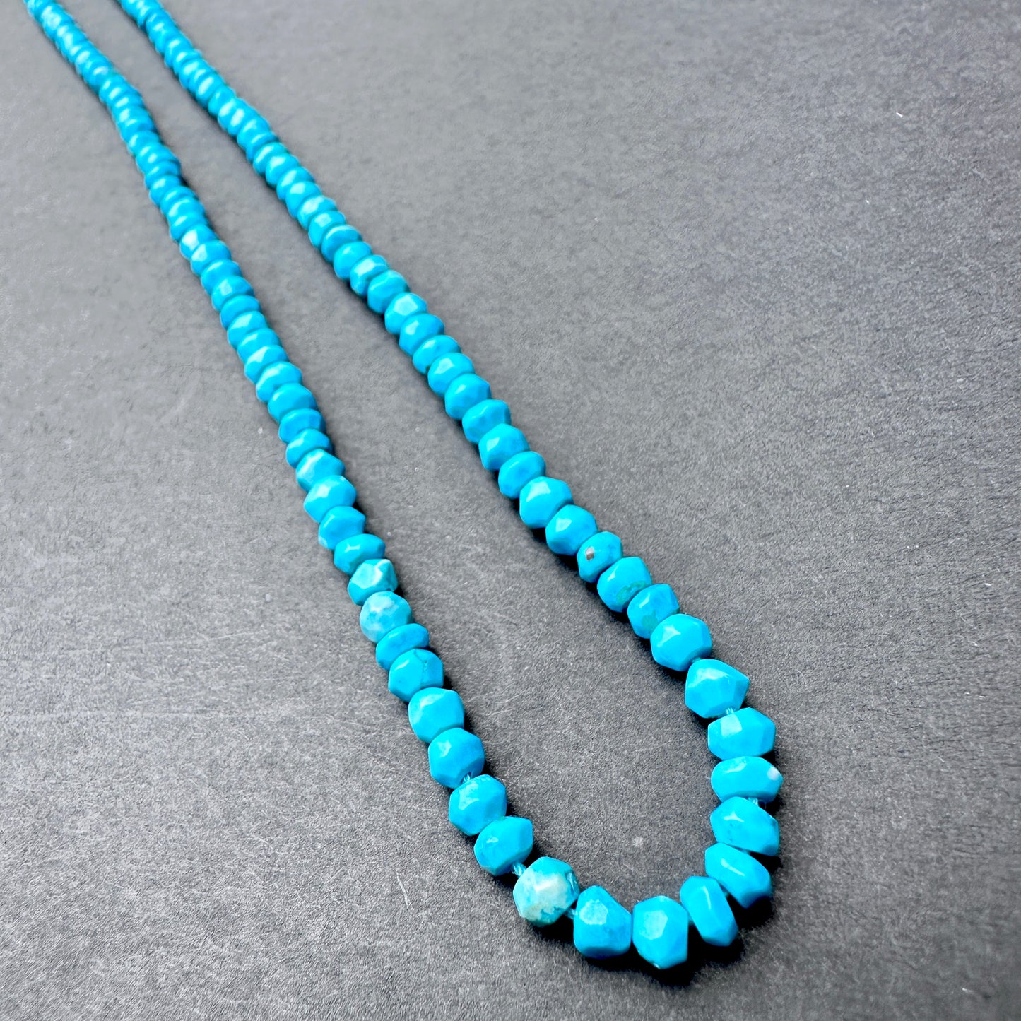 Stone Beads in Howlite Turquoise with refined faceted rondelle cut for handmade jewellery components.