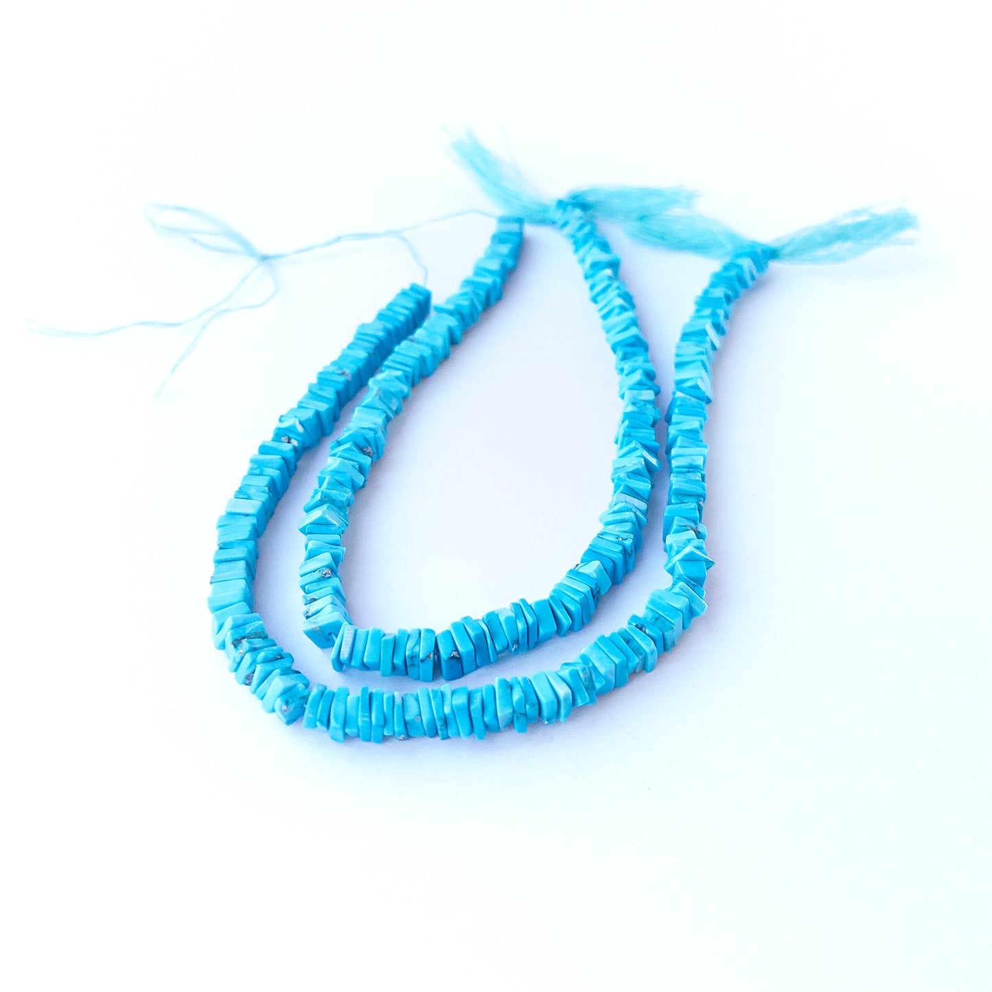 Genuine Howlite Turquoise stone beads for DIY jewellery featuring polished square heishi shaping.