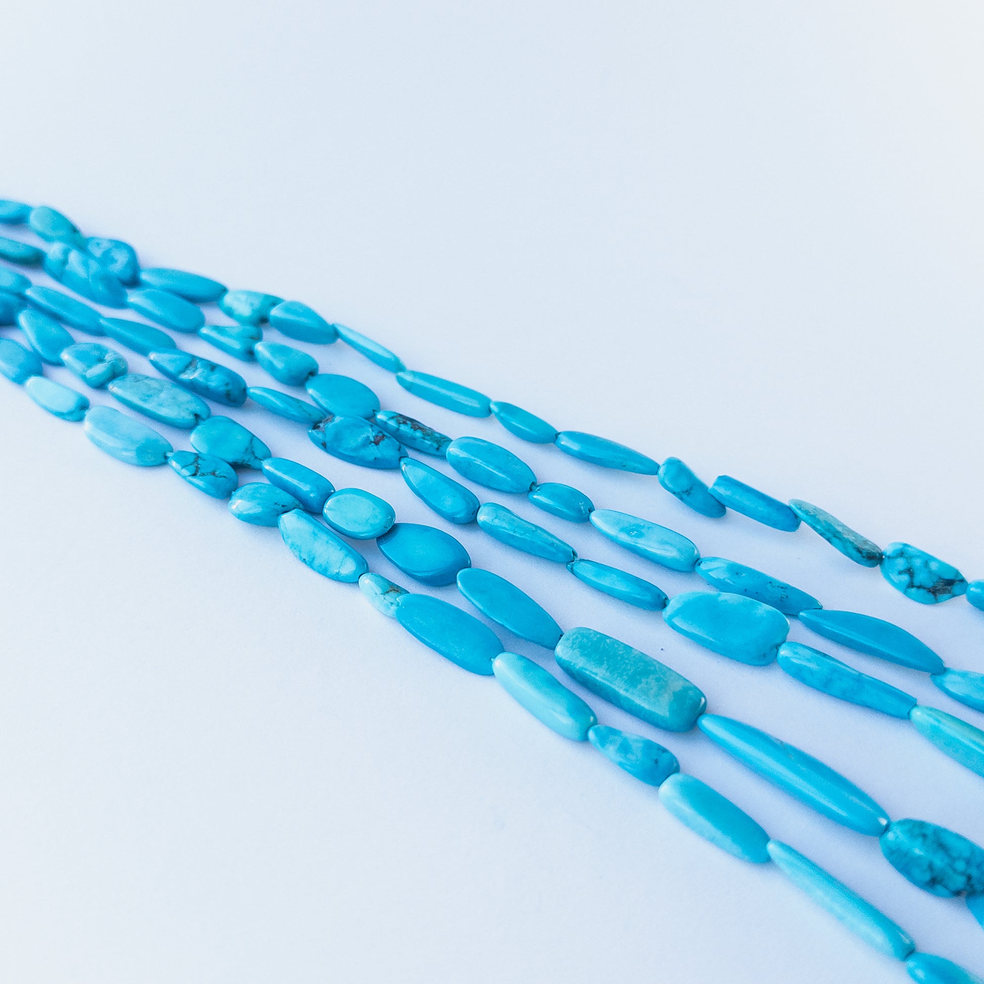 High‑quality Howlite Turquoise tumble beads with soothing blue shades perfect for gemstone bead jewellery making.