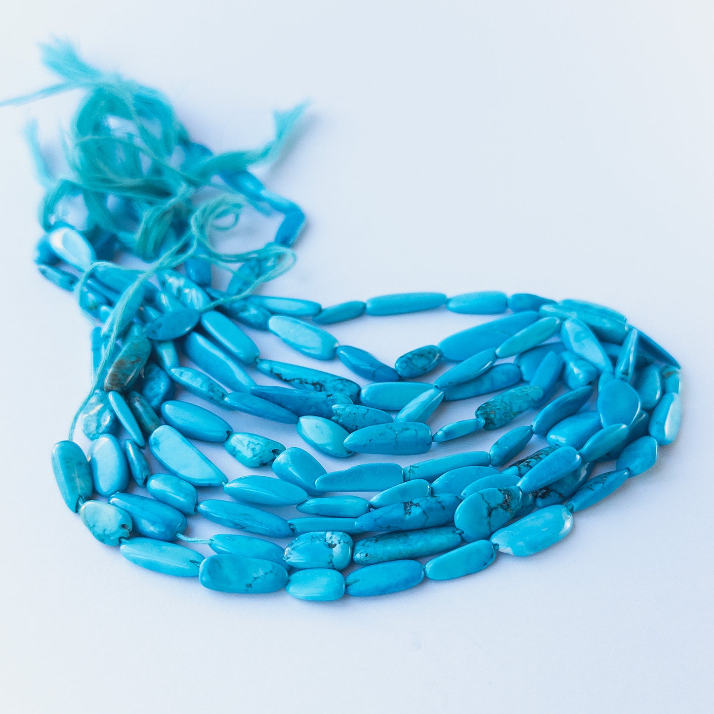 Authentic Howlite Turquoise gemstone beads showcasing organic tumble cuts ideal for handmade jewellery components.