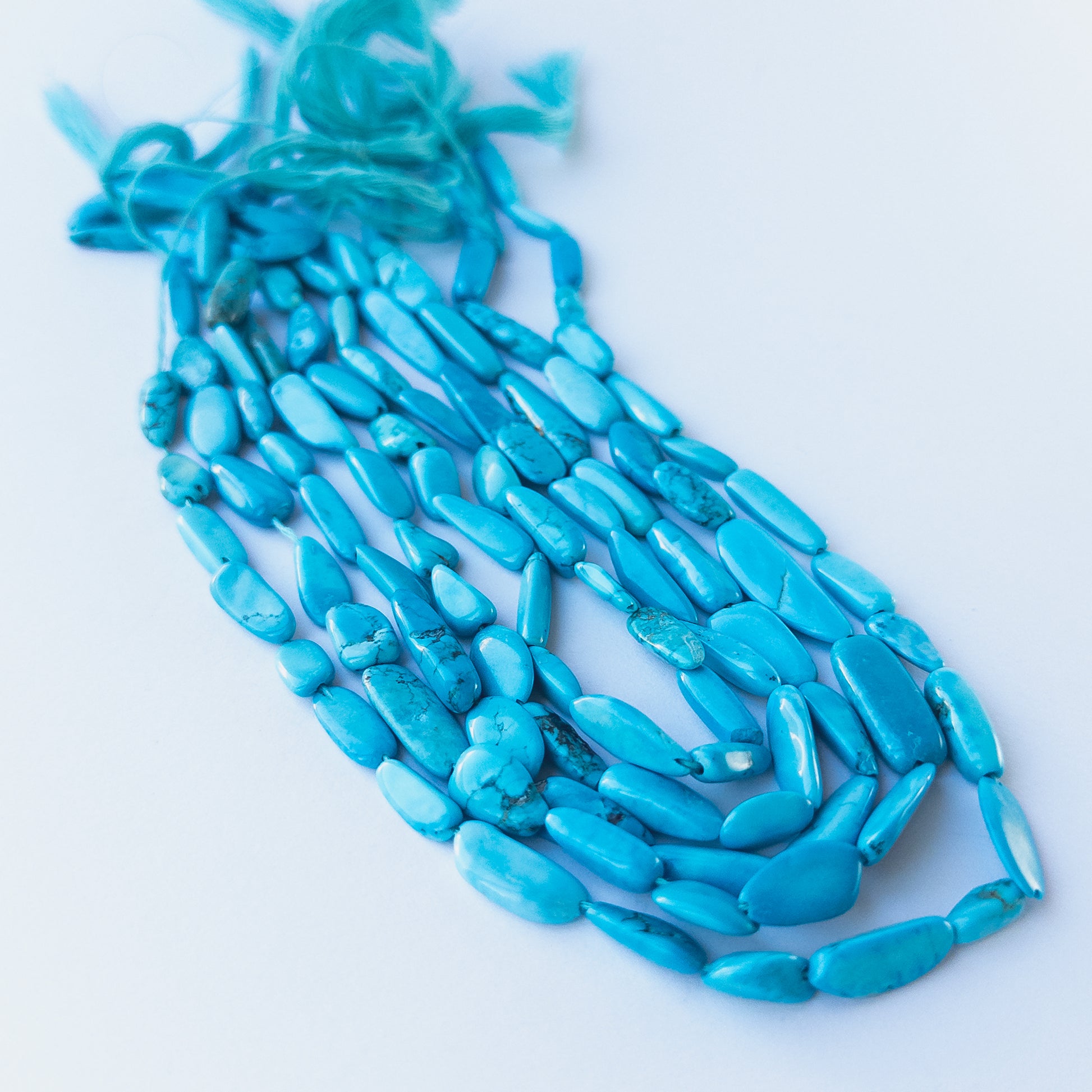 Genuine Howlite Turquoise stone beads for DIY jewellery featuring polished tumble shaping and calming colour.