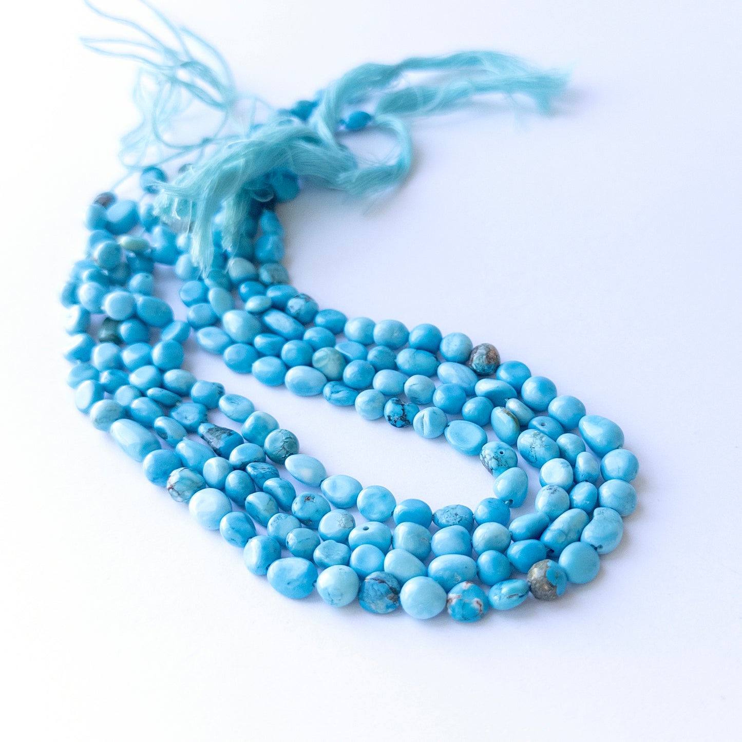 Authentic Howlite Turquoise stone beads with smooth tumble cut, ideal for DIY jewellery makers seeking quality gemstone components.