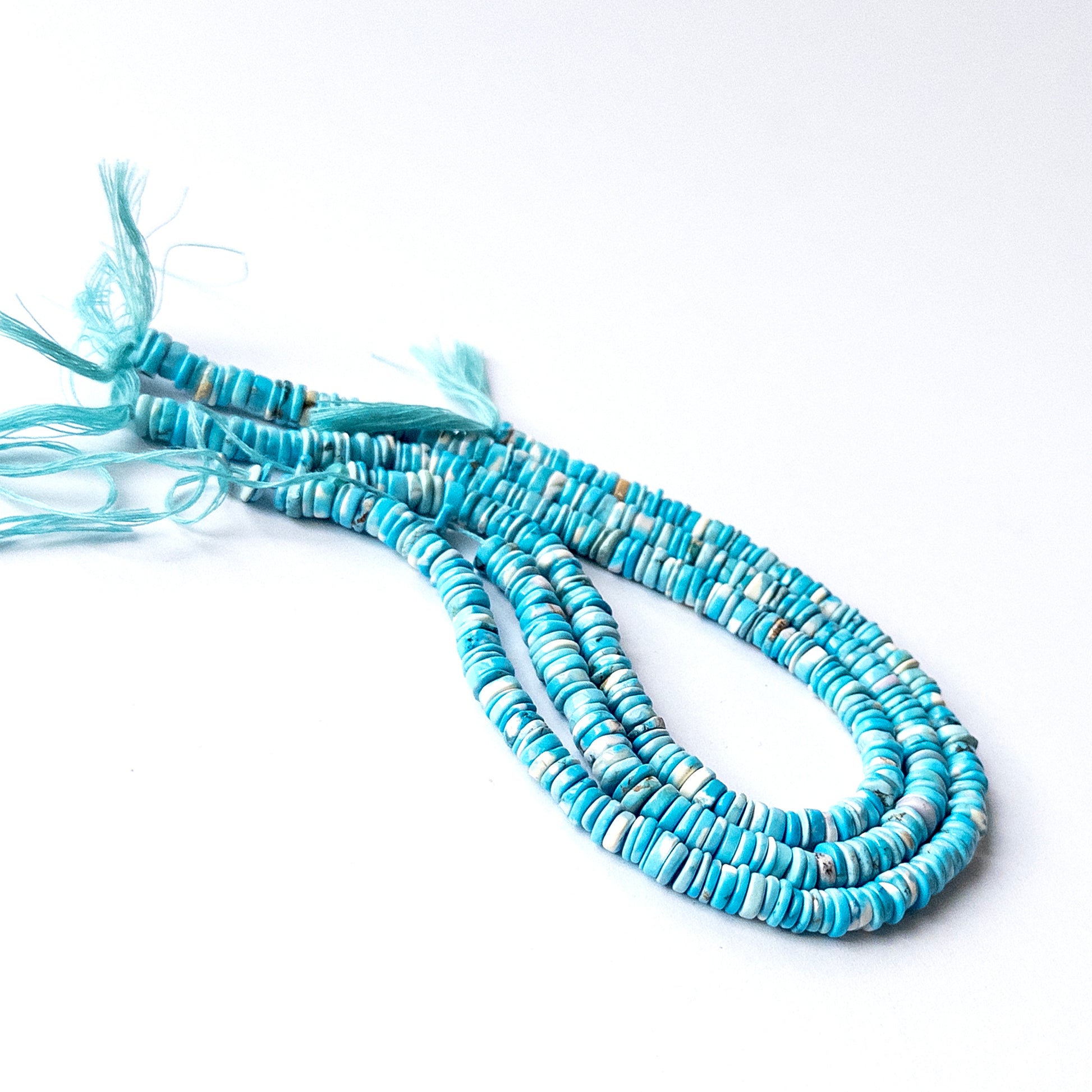 Authentic Howlite Turquoise smooth wheel beads with even cutting and bold colour for DIY jewellery making.