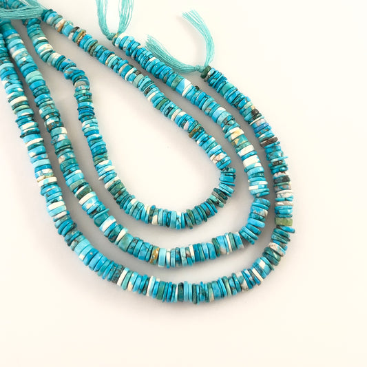Howlite Turquoise smooth wheel heishi gemstones with clean rounded shaping and vivid blue tones across a 20cm strand.