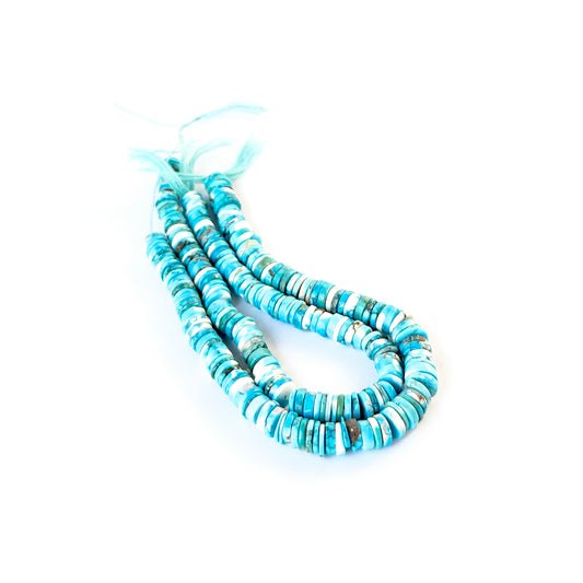Howlite Turquoise stone beads in heishi cut, showcasing soft blue tones and a clean, consistent finish.