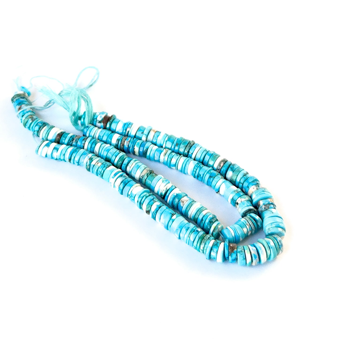 Howlite Turquoise stone beads with smooth heishi cut, ideal for DIY jewellery and artisan beadwork.