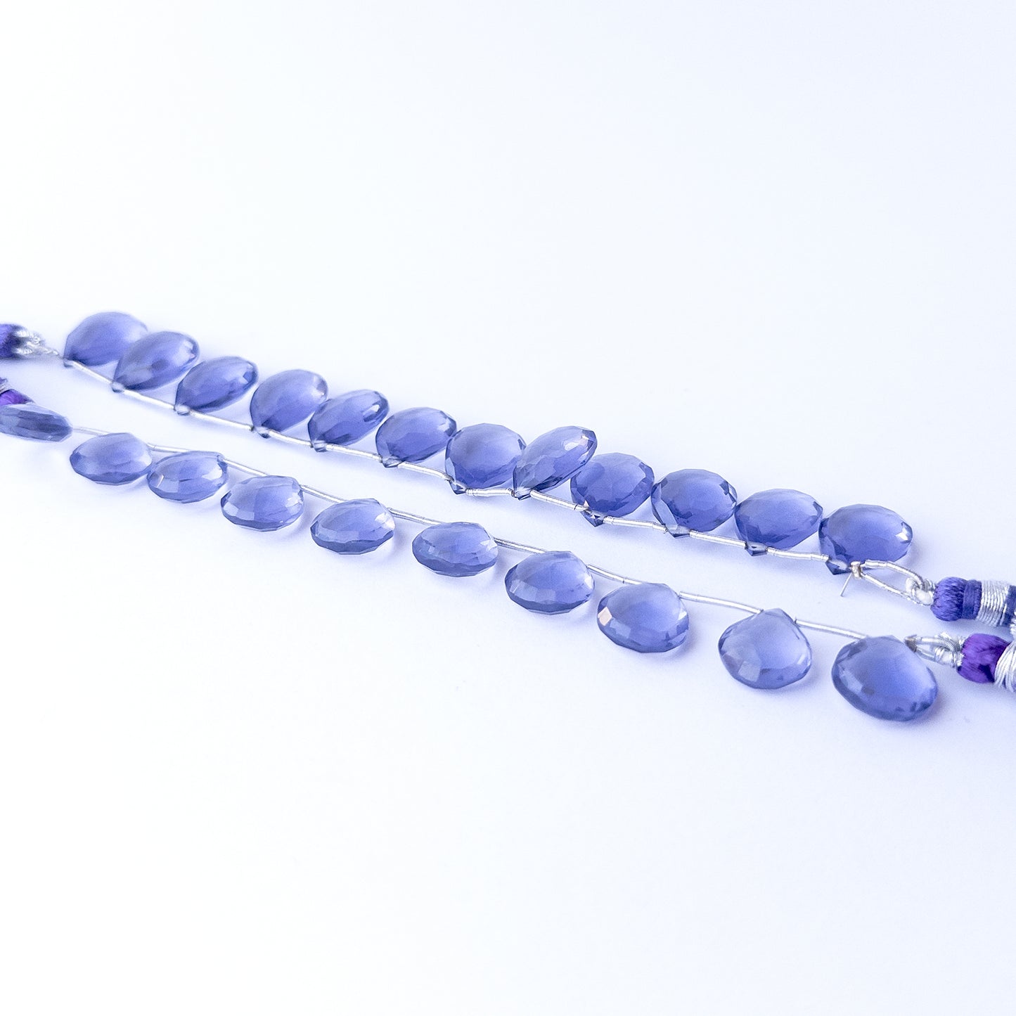 Handmade jewellery components featuring hydro faceted briolette beads in neatly matched sets.