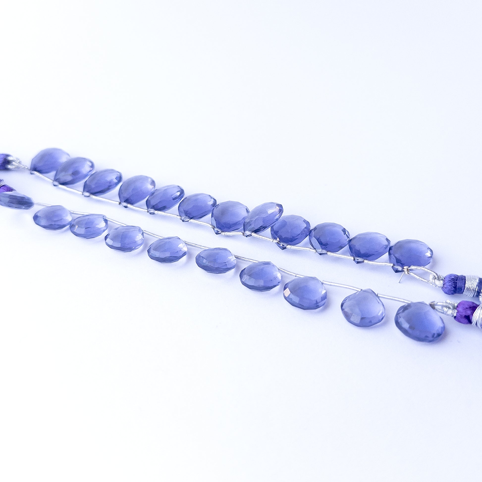 Handmade jewellery components featuring hydro faceted briolette beads in neatly matched sets.