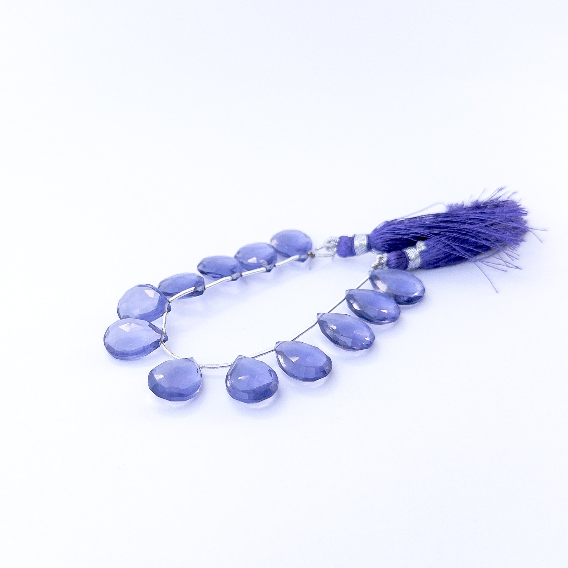 Genuine hydro quartz beads with sparkling faceted briolette shaping, ideal for DIY jewellery and artisan beadwork.
