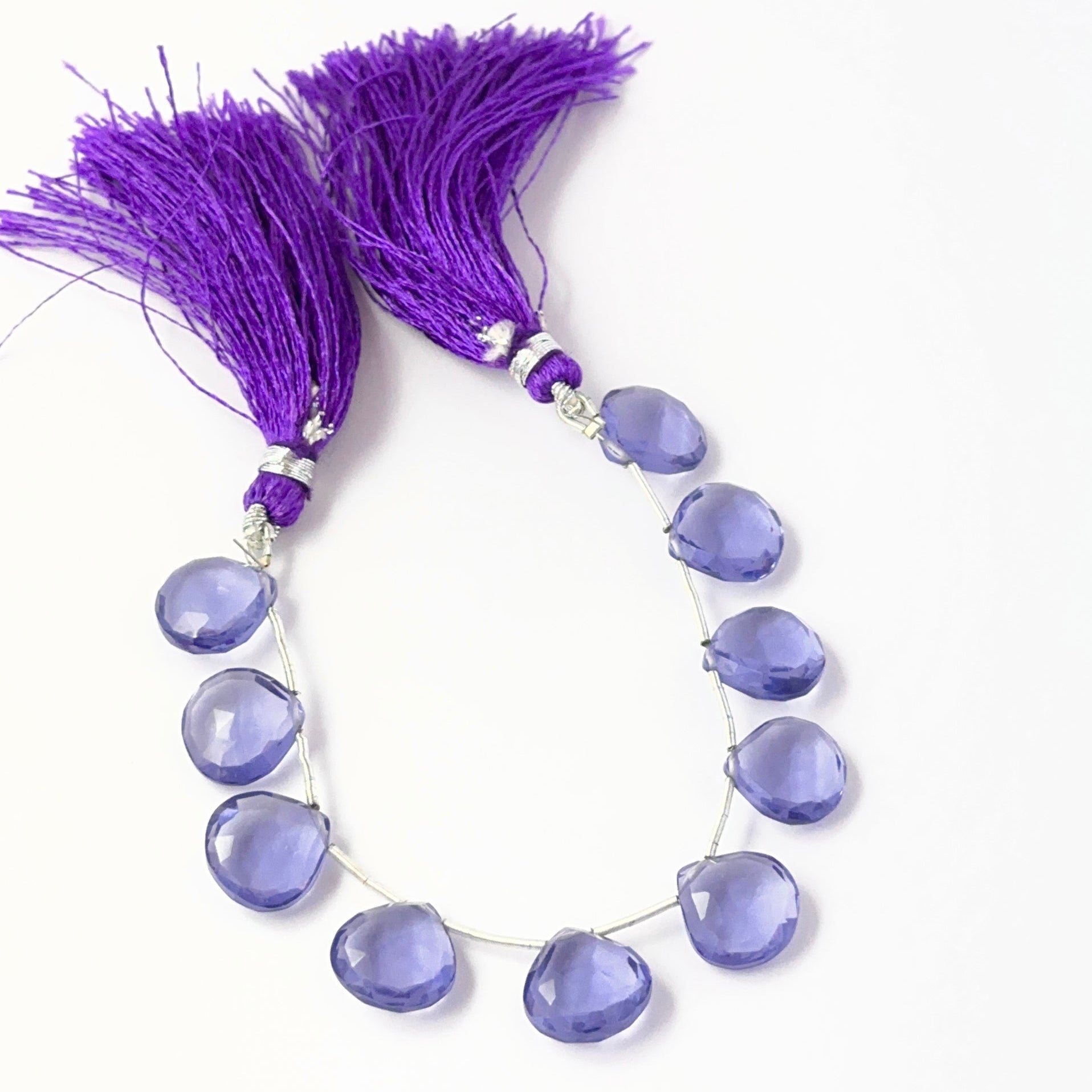 Hydro faceted briolette gemstone beads, 12mm size, arranged on a 17cm strand for handmade jewellery makers.