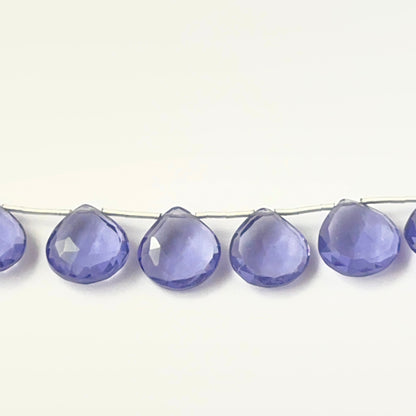 Genuine hydro stone beads in faceted briolette cut, showcasing bright clarity for DIY jewellery design.