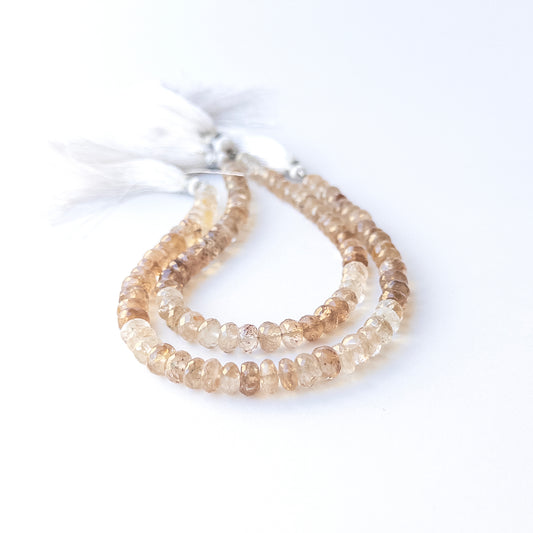 Authentic Imperial Topaz gemstone beads showing rich colour and sparkle, ideal for artisan beadwork.