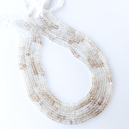 Imperial White Topaz faceted rondelle beads displaying natural sparkle and premium craftsmanship.