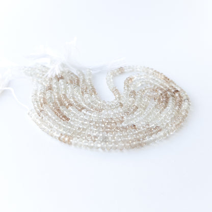 Authentic Imperial White Topaz rondelle beads with shimmering brilliance, ideal for DIY jewellery and beadwork.