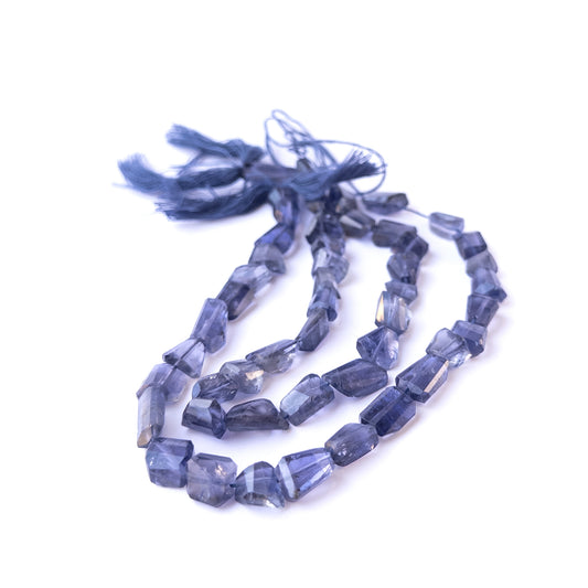 Authentic iolite gemstone beads with polished faceted tumble cuts, ideal for handmade jewellery components.