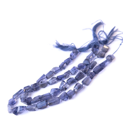 Genuine stone beads in deep violet‑blue hues, featuring faceted tumbles for DIY jewellery making.