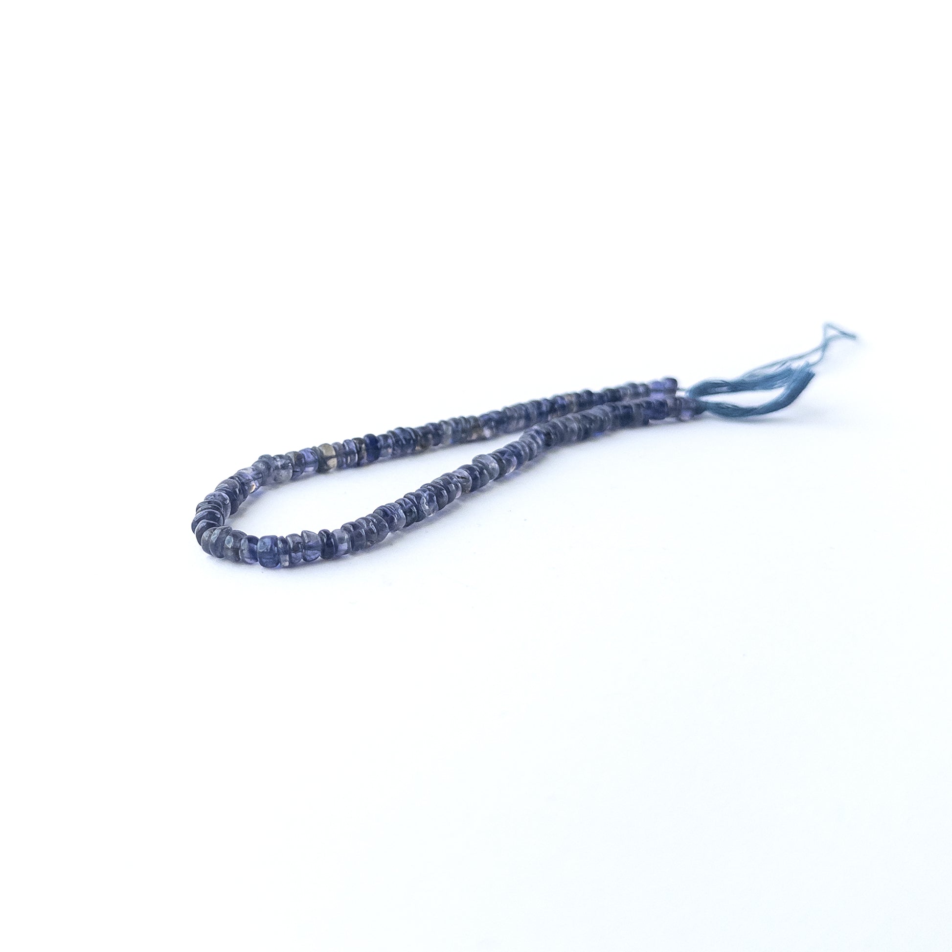 Genuine Iolite smooth wheel stone beads with a polished finish ideal for gemstone beads for DIY jewellery making.