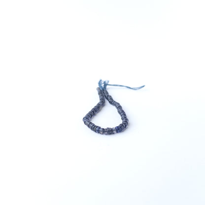 Authentic Iolite gemstone beads showcasing rich colour, smooth wheel shaping and premium bead quality for jewellery designers.