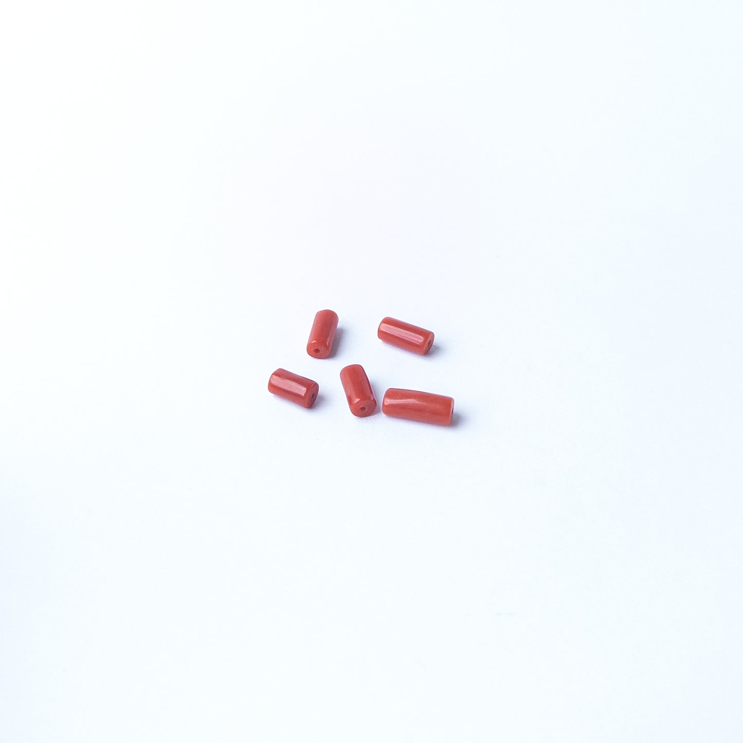 Genuine Italian Coral gemstone beads showcasing elegant colour and shine, perfect for premium jewellery design projects.
