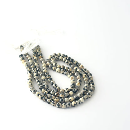 Jasper smooth round gemstone beads showing earthy tones and a polished finish