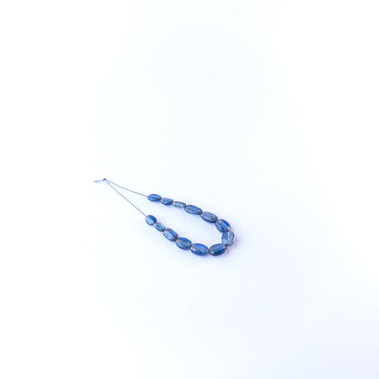 Authentic kyanite gemstone beads featuring rich blue colour and polished oval finish for premium jewellery.