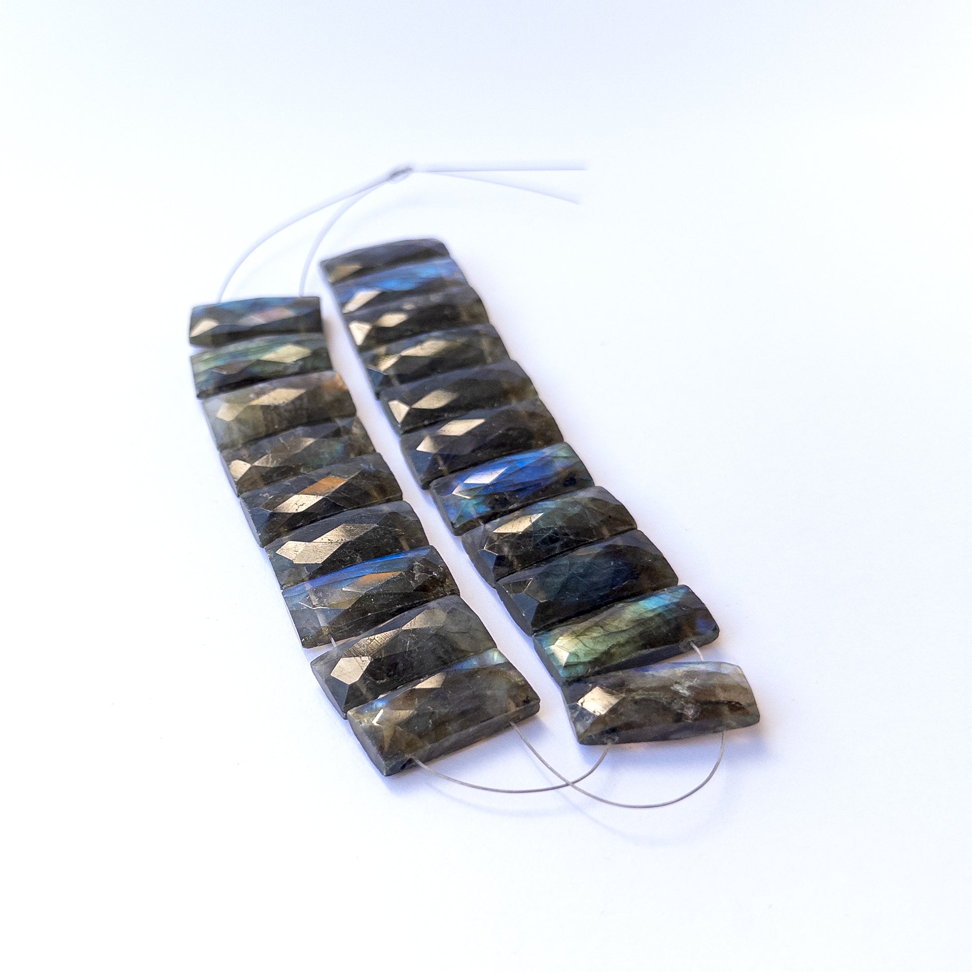 Labradorite faceted rectangle gemstone beads in 20×9.5mm size showcasing blue‑grey flashes for jewellery making.