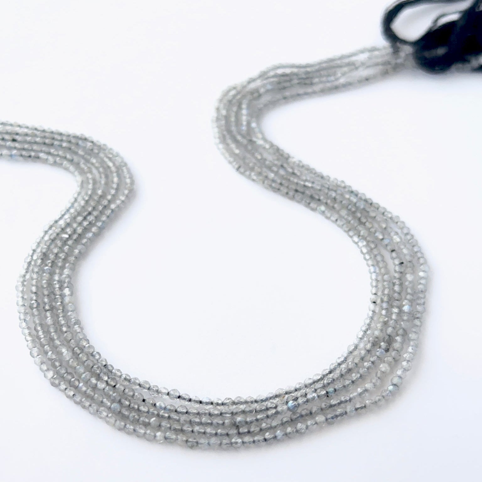 Labradorite rondelle beads with natural shimmer and fine faceting for creative jewellery designs