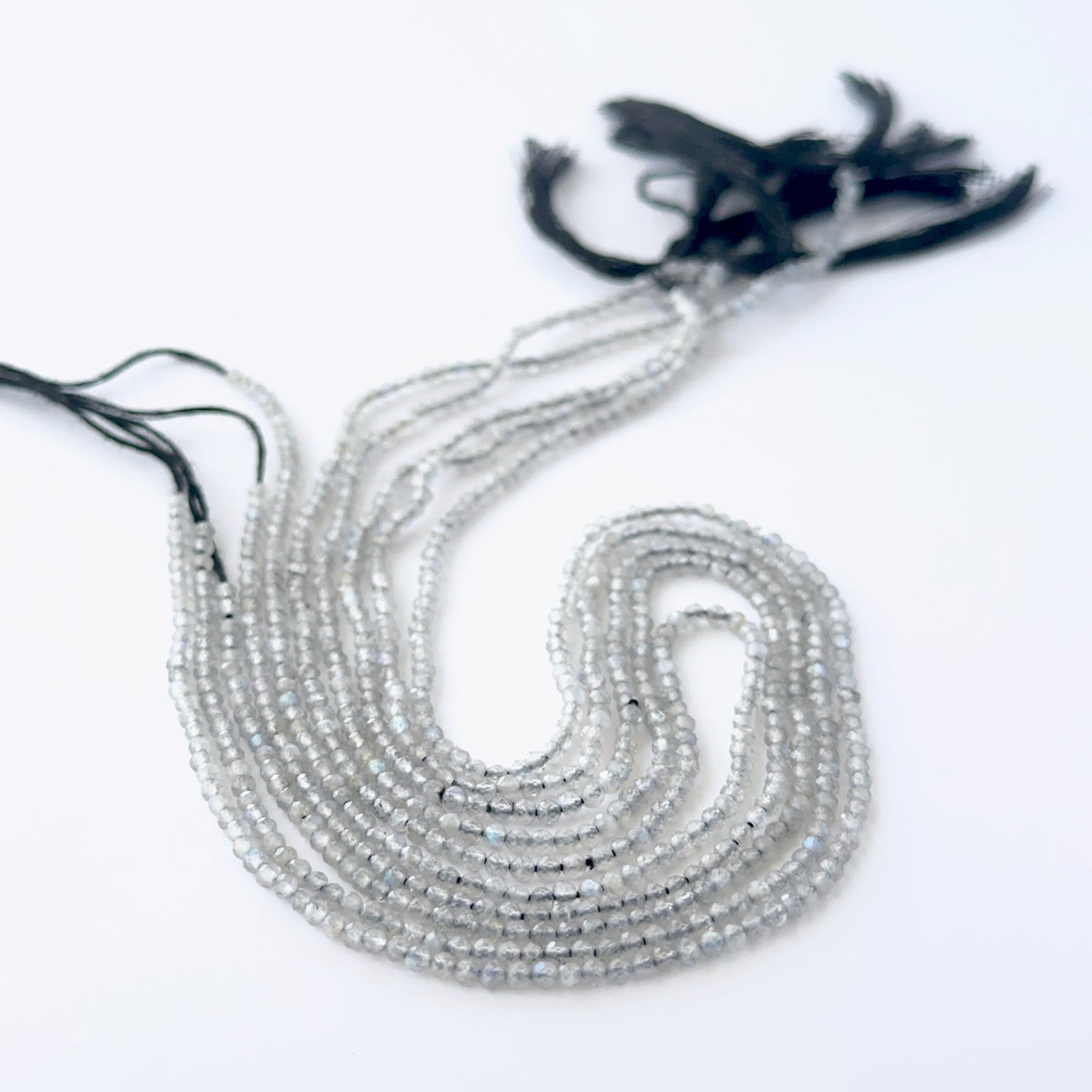 Labradorite rondelle beads with natural shimmer and fine faceting for creative jewellery designs