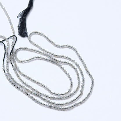 Soft‑hued Green Opal stone beads in faceted rondelle cut, displaying polished sparkle for jewellery designers.