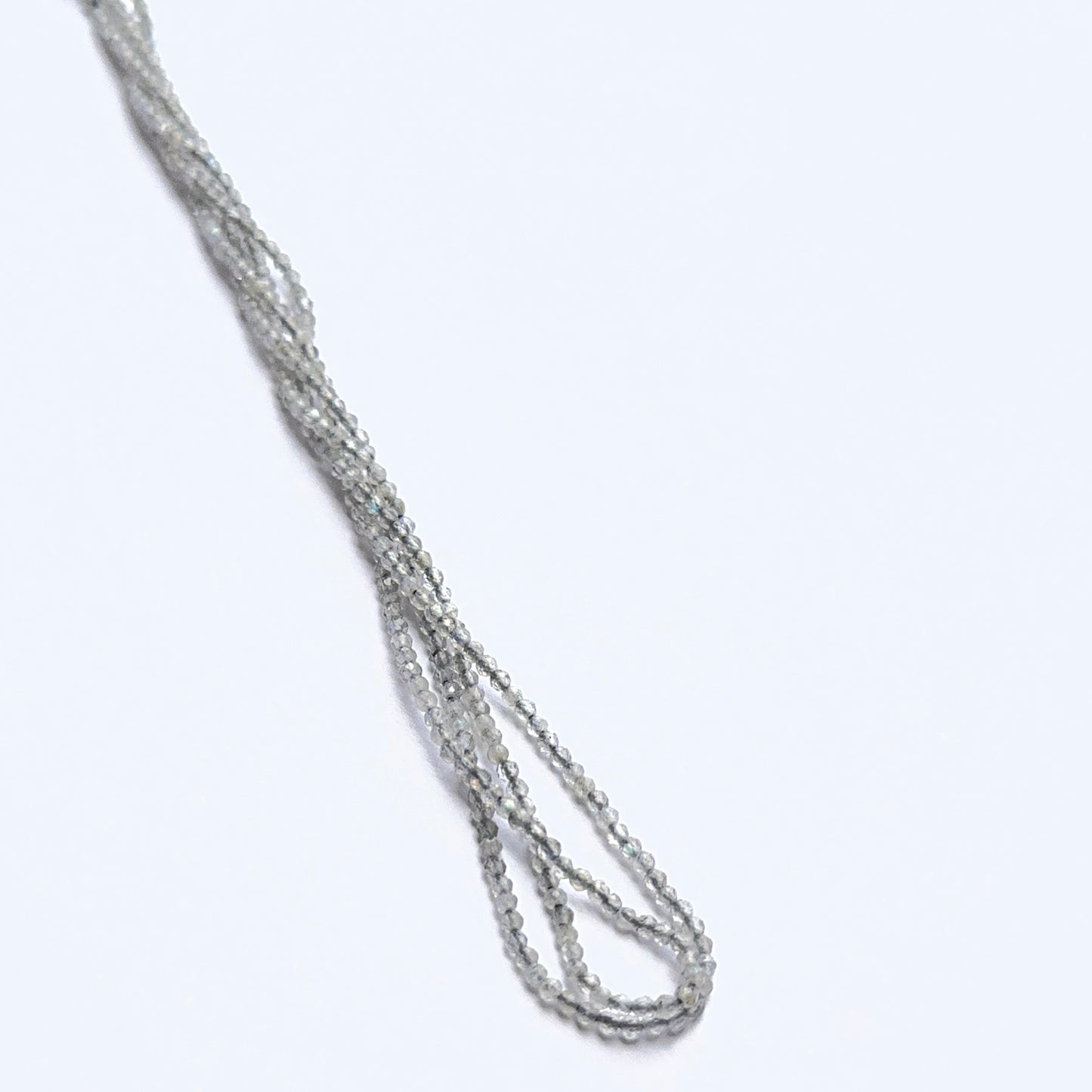 Soft‑hued Green Opal stone beads in faceted rondelle cut, displaying polished sparkle for jewellery designers.