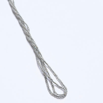 Soft‑hued Green Opal stone beads in faceted rondelle cut, displaying polished sparkle for jewellery designers.