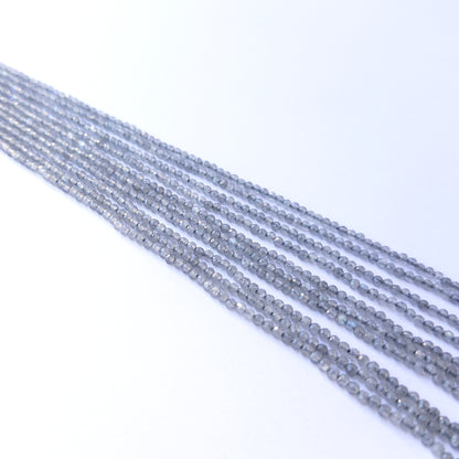 Genuine Labradorite gemstone beads in faceted rondelle shape, displaying polish, shimmer, and natural beauty for jewellery crafting.